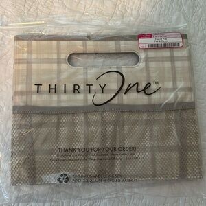 Fold N' File, new in bag. Color is called “Soft Plaid”.